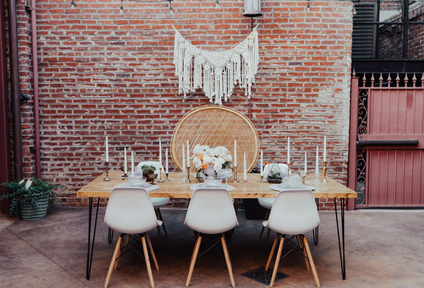 Bohemian bridal shower table with peacock chair