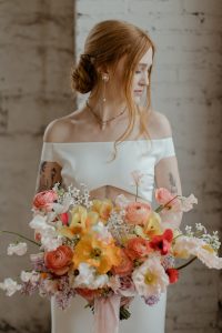 Bride holding bouquet from Fleurish