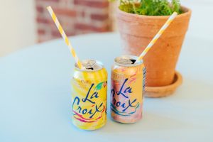 la croix with yellow striped straws at wedding in Arkansas