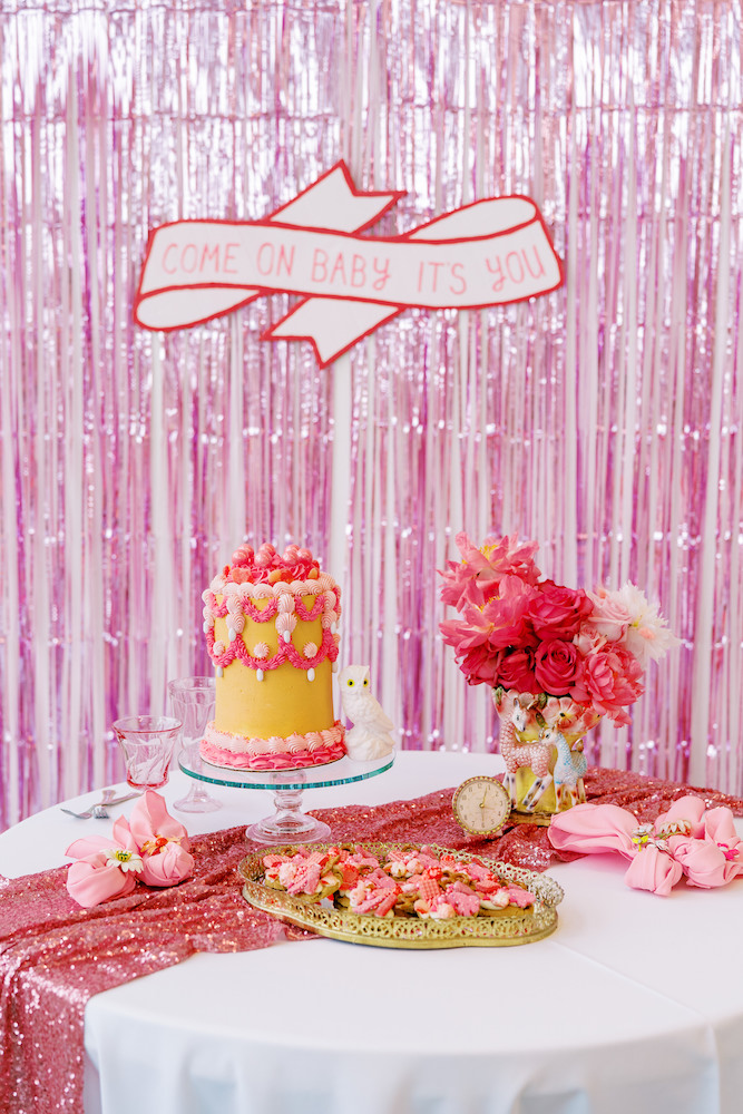 kitschy pink and gold cake wedding photoshoot