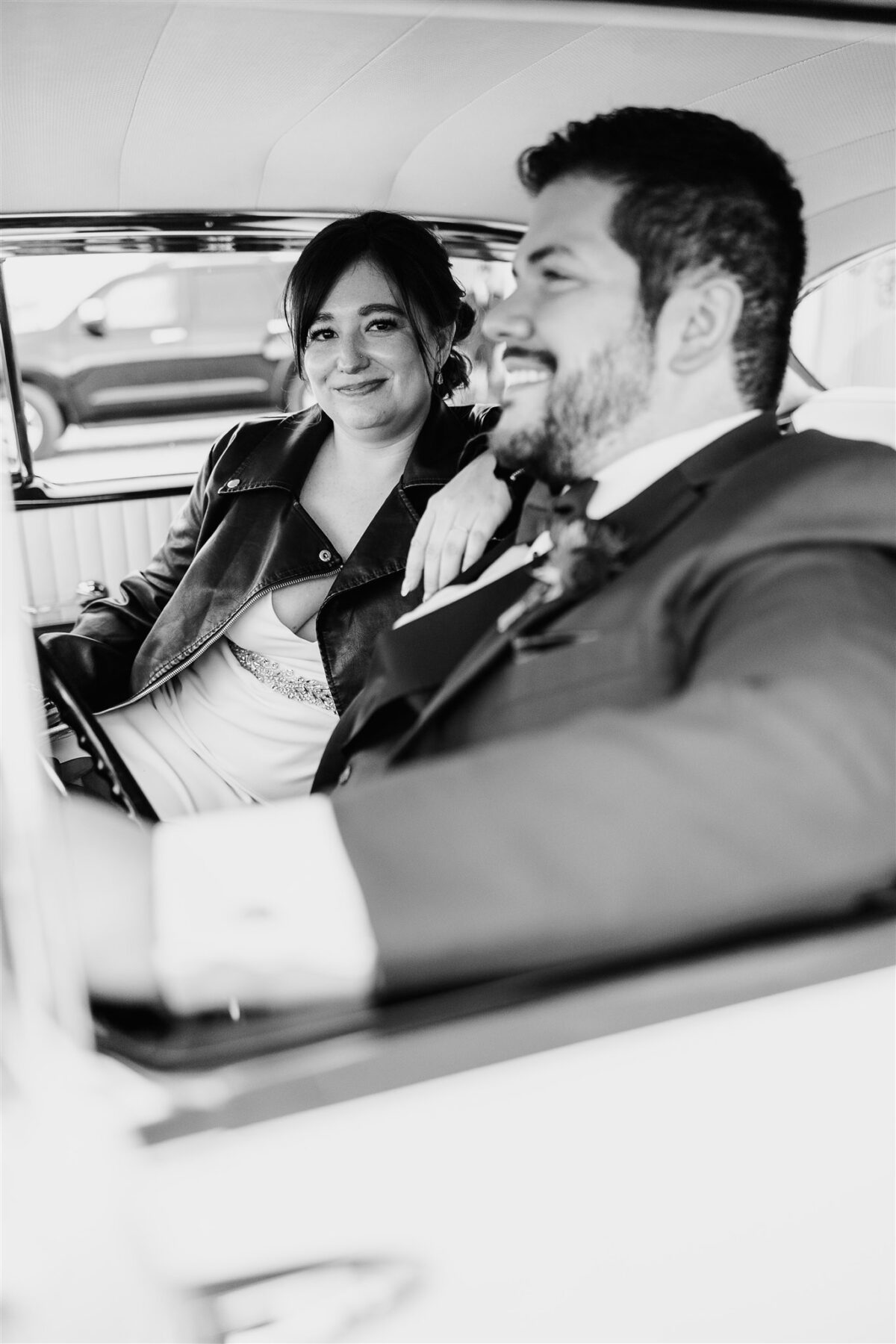 wedding couple in vintage car editorial