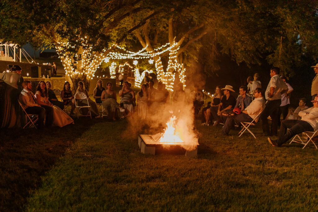 Bonfire devotional at the end of a wedding in Lubbock, Texas